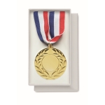 Medalha de ferro com fita tricolor azul, branca e vermelha cor dourado